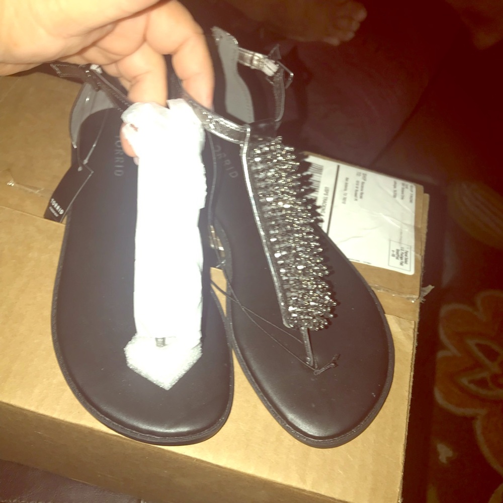 Torrid 8 1/2 wide. Never worn!!!